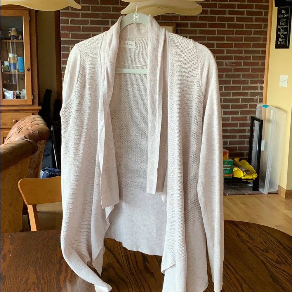 a beige cardigan! perfect condition!